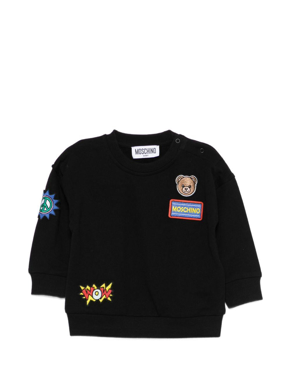 Felpa per neonati Moschino Kids nera con dettagli in rilievo M9F03QLCA19 60100 MOSCHINO KIDS