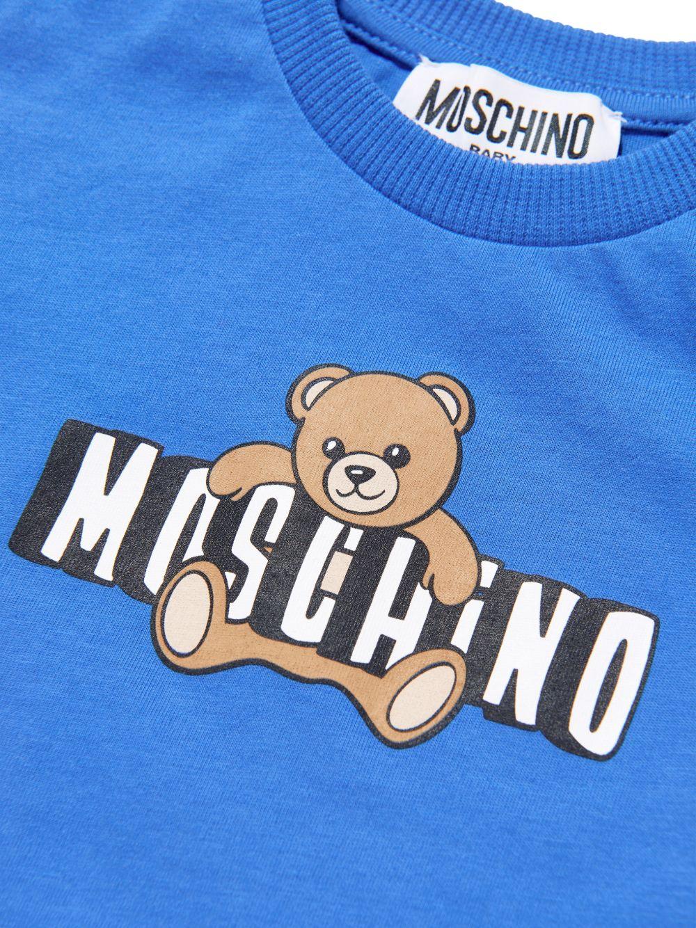 T-shirt per neonati Moschino Kids blu con logo sul davanti MUM04PLAA03 40630 MOSCHINO KIDS