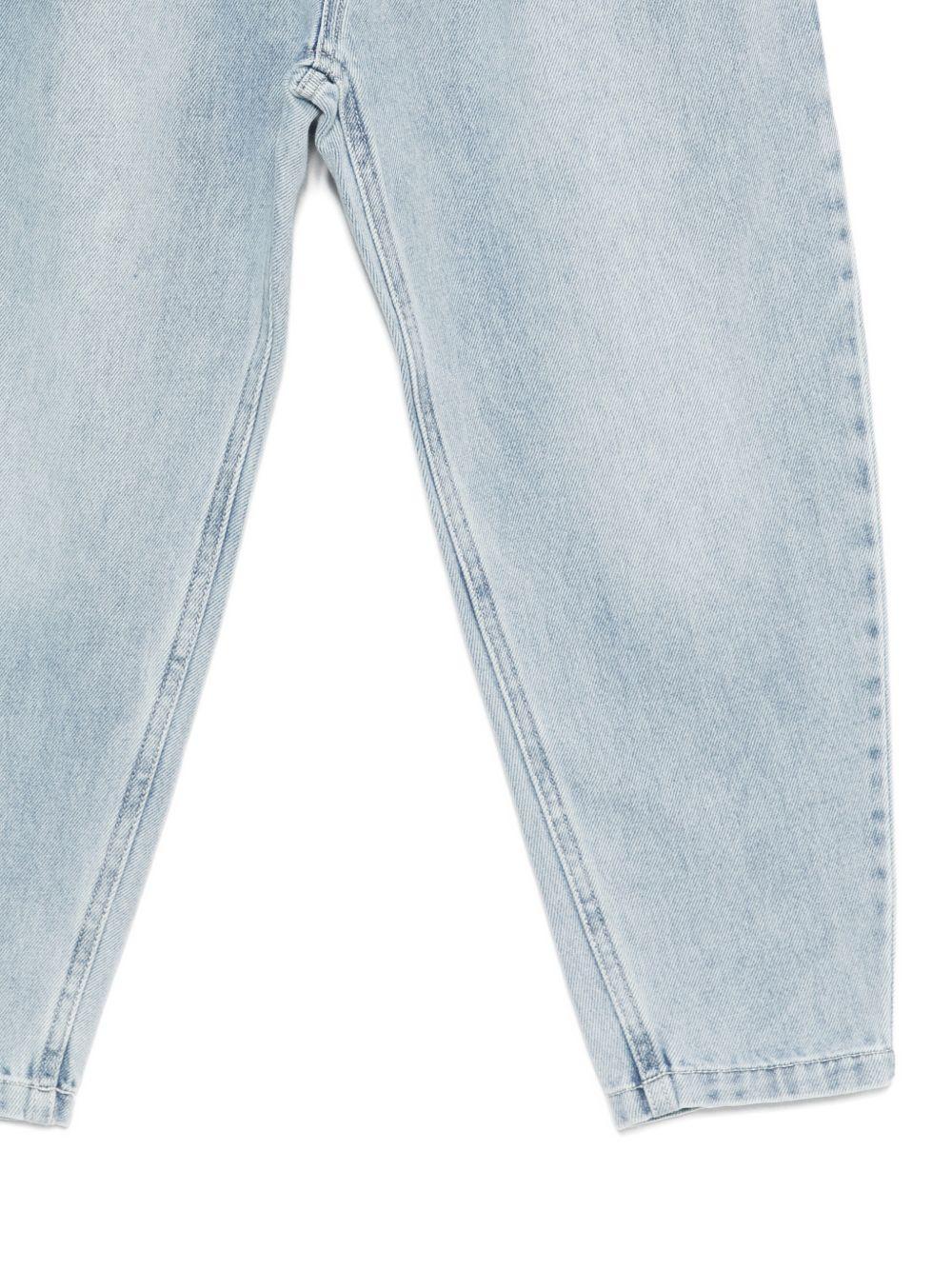 Jeans per bambina Moschino Kids azzurro con stampa ciliegie sul retro HDP06WL0E34 40186 MOSCHINO KIDS