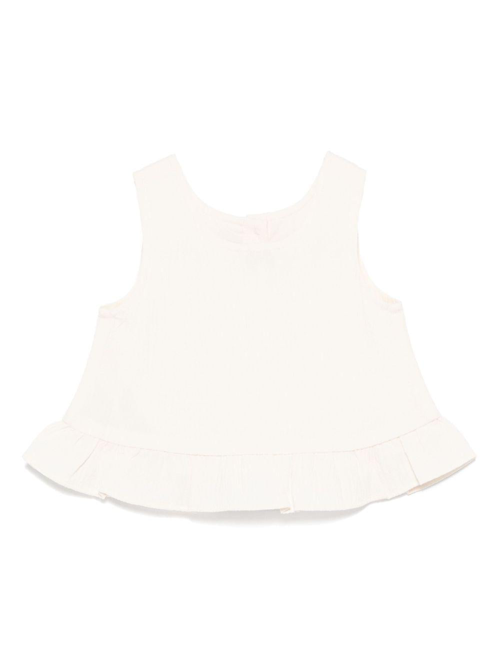 Top per neonata Donsje Francise bianco con orlo increspato 3036300 00003 DONSJE