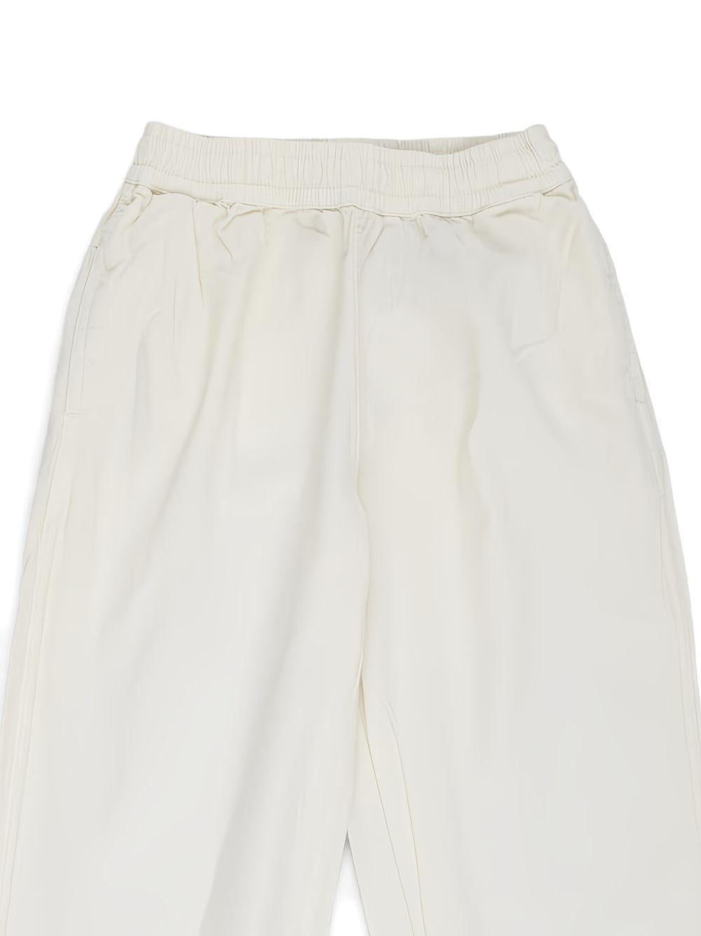 Pantaloni sportivi per bambino Molo beige con vita elasticizzata 1S26I105 8894 MOLO