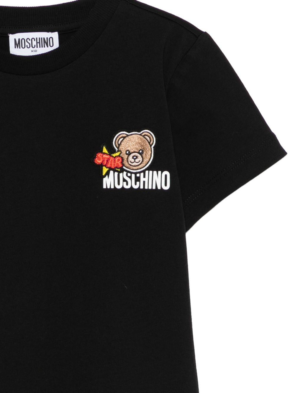 T-shirt per bambini Moschino Kids nera con ricamo Teddy Bear HTM058LAA24 60100 MOSCHINO KIDS
