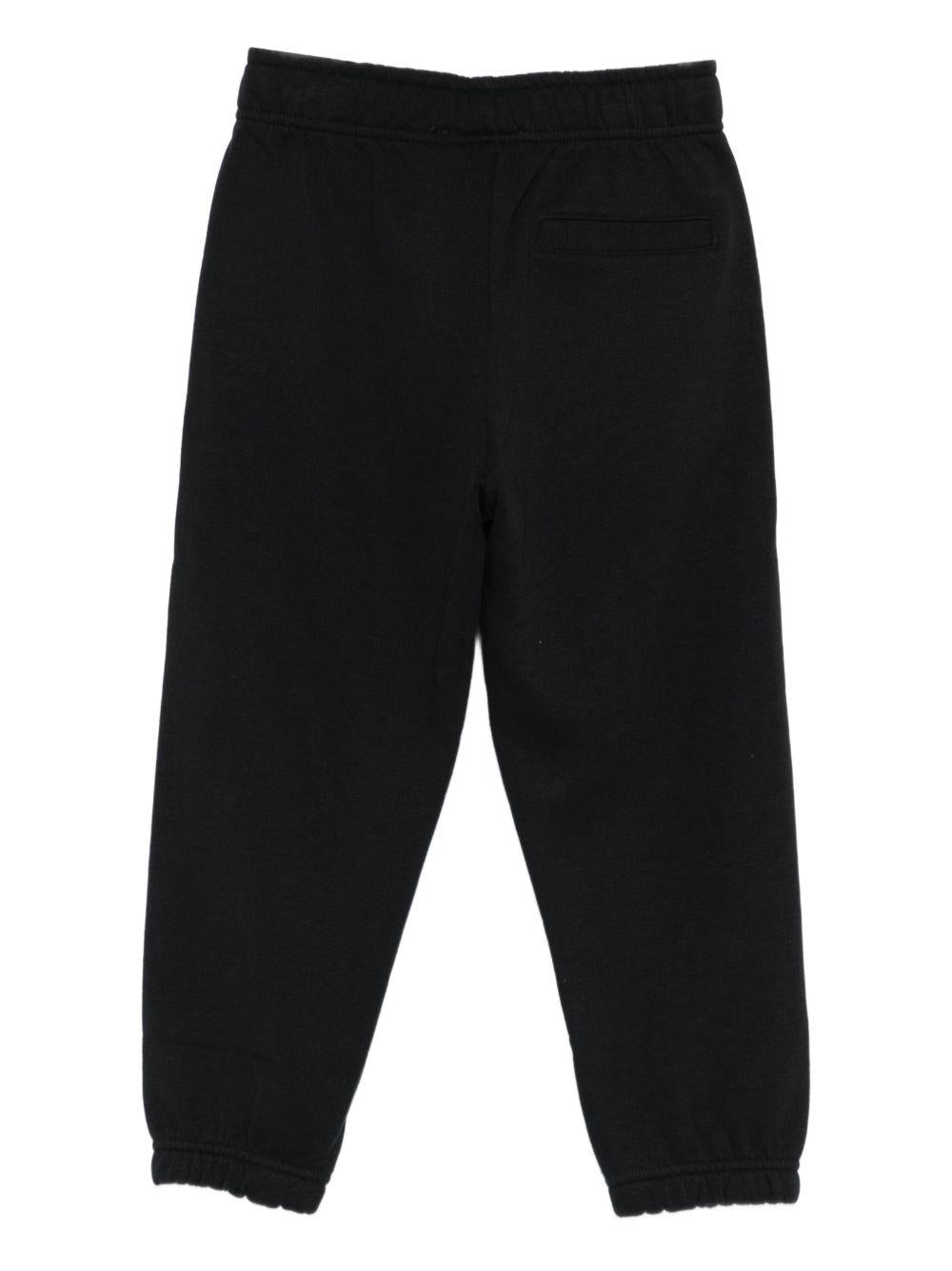 Pantaloni sportivi per bambino Molo neri con motivo basketball 1S26I203 0099 MOLO KIDS