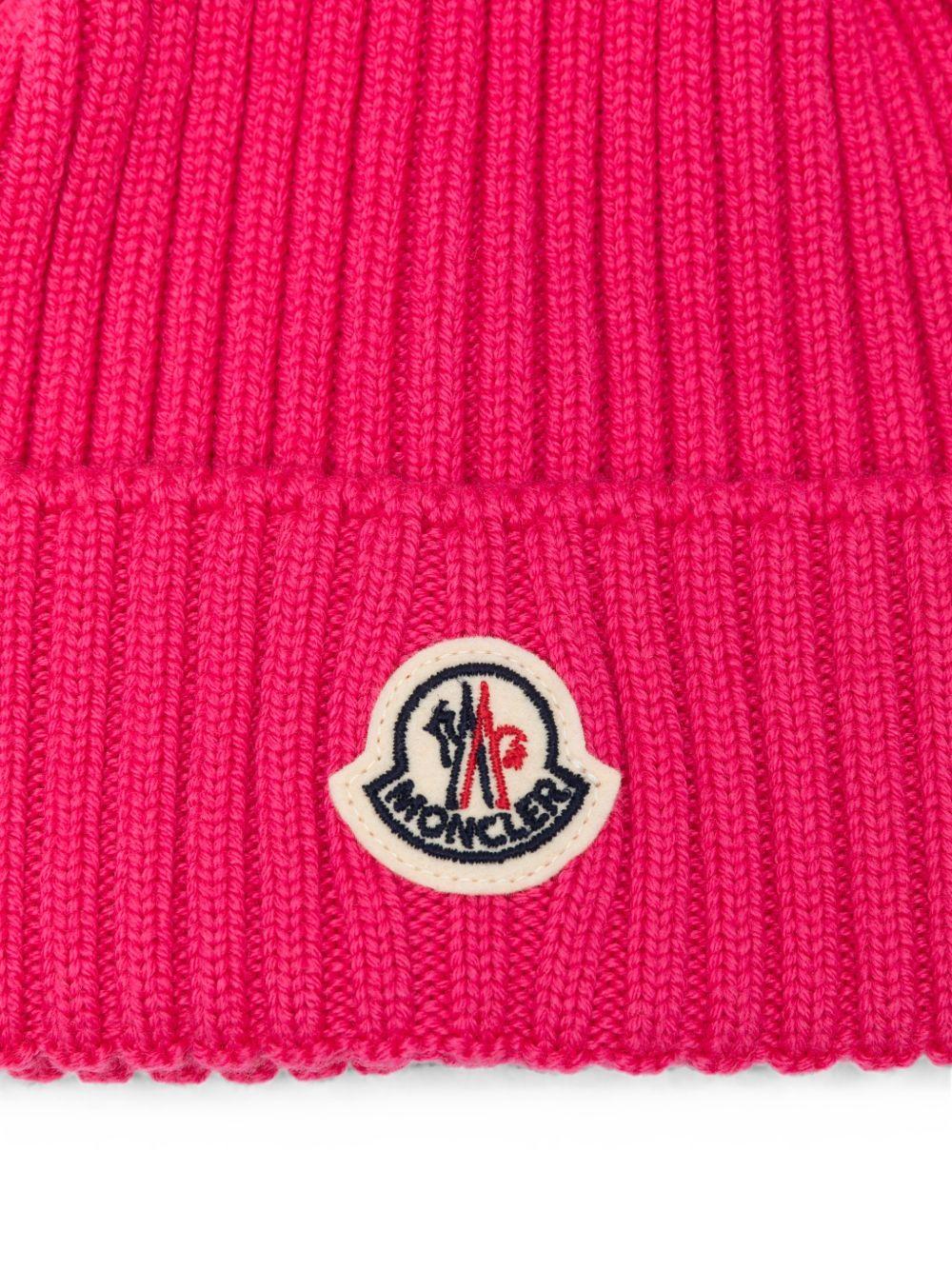 Cappello per bambina Moncler Enfant fucsia con ponpon L29543B00007A9327 N55 MONCLER KIDS