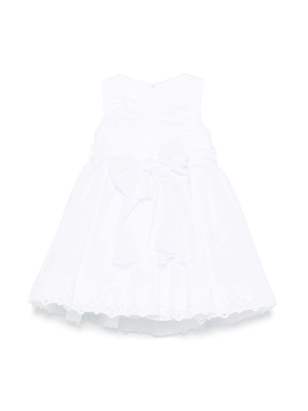 Abito per neonata Colorichiari bianco con arricciatura e applicazione a fiori FN108048 4846a 1086 COLORICHIARI