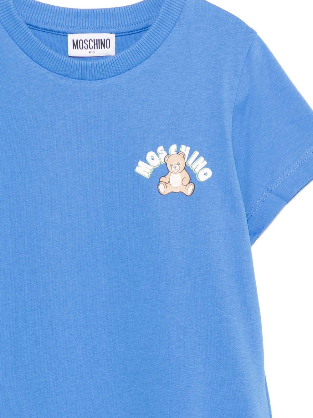 T-shirt per bambini Moschino Kids azzurra con stampa Teddy Bear HWM058LAA01 40630 MOSCHINO KIDS