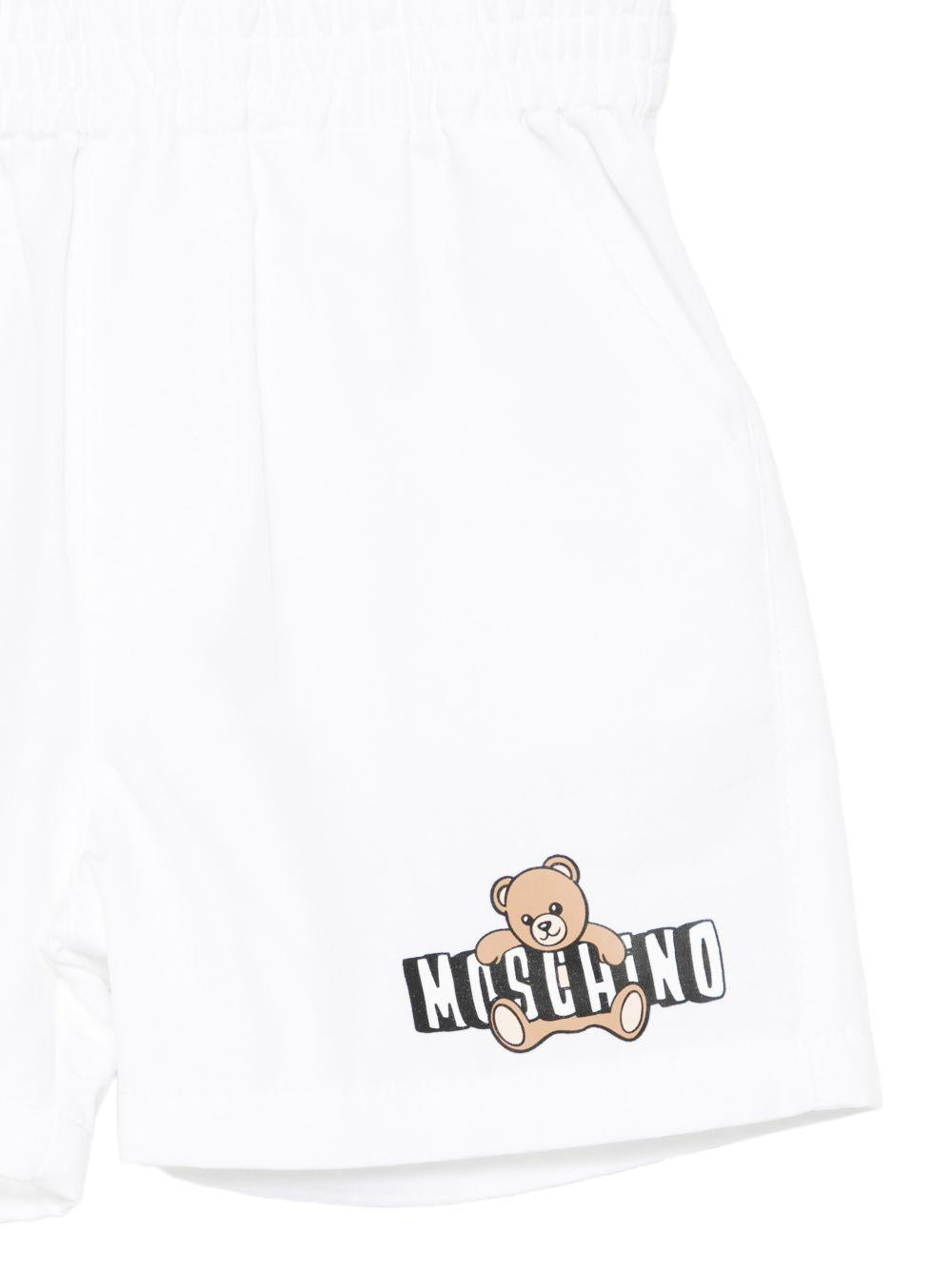 Shorts per neonati Moschino Kids bianchi con orsetto sul davanti MUQ01NLLA14 10101 MOSCHINO KIDS