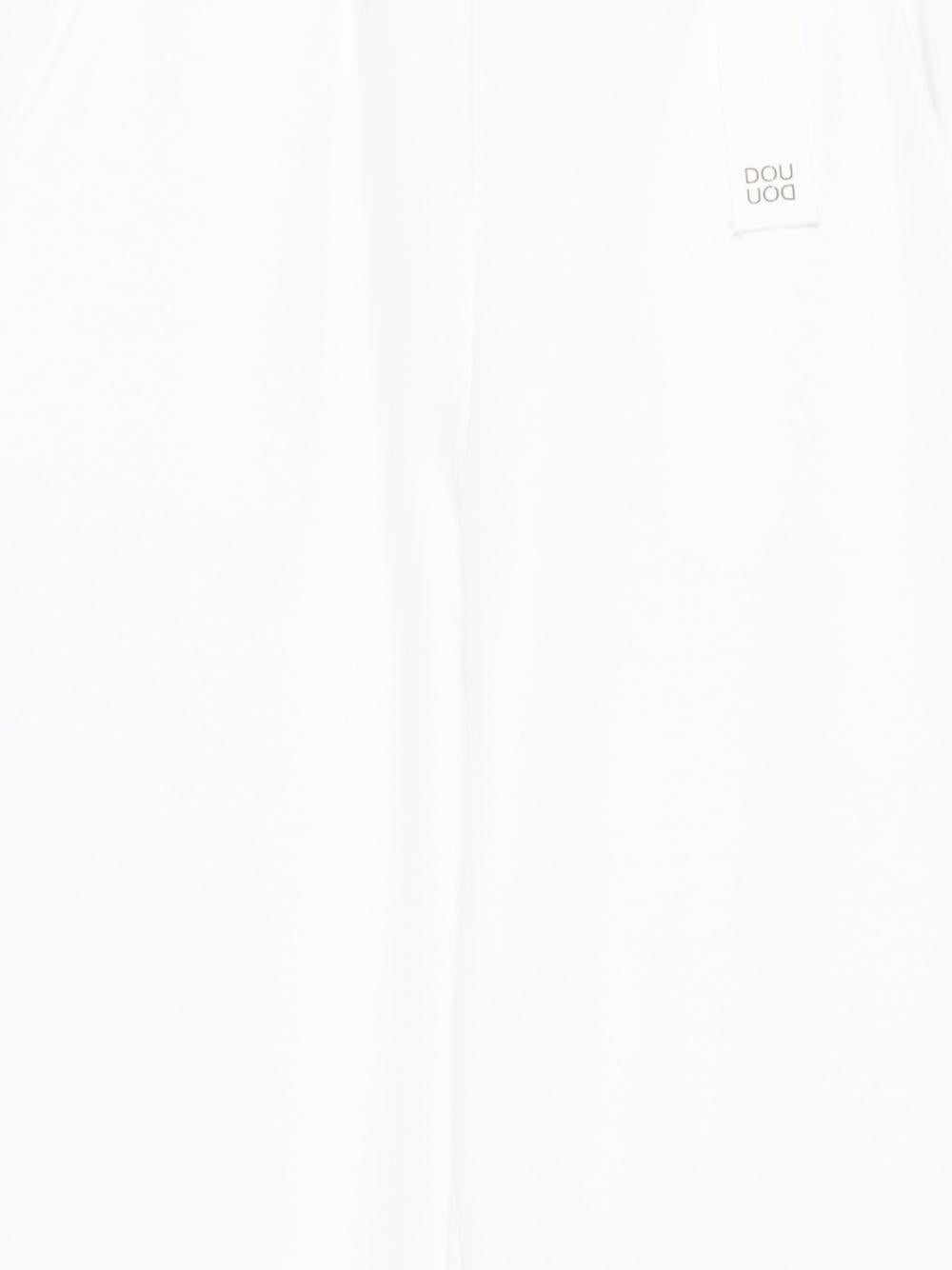 Pantaloni per bambina Douuod Kids bianchi con gamba larga DY6A80 J0371 100 DOUUOD KIDS