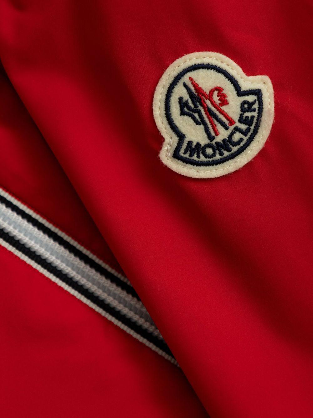 Giubbino per bambino Moncler Enfant rosso reversibile con cappuccio e orli elasticizzati K19541A00114597YW 455 MONCLER ENFANT