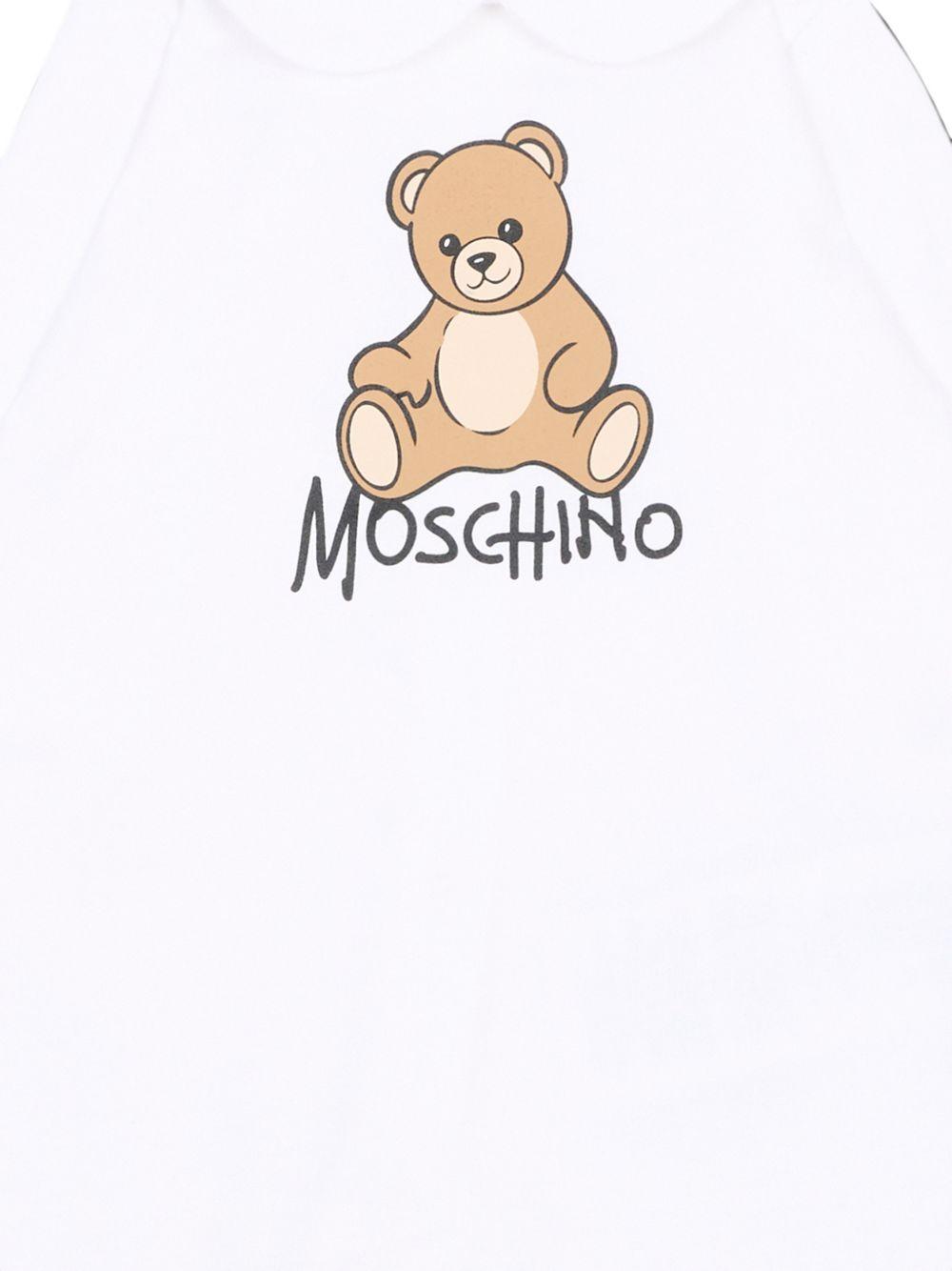 Tutina per neonati Moschino Kids bianca con dettaglio Teddy Bear M5Y037LCA40 10101 MOSCHINO KIDS