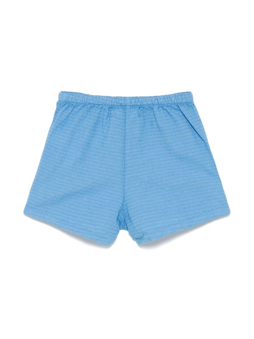 Shorts per neonato Bobo Choses Smilling azzurro con applicazione frontale con logo B125AB044 421 BOBO CHOSES