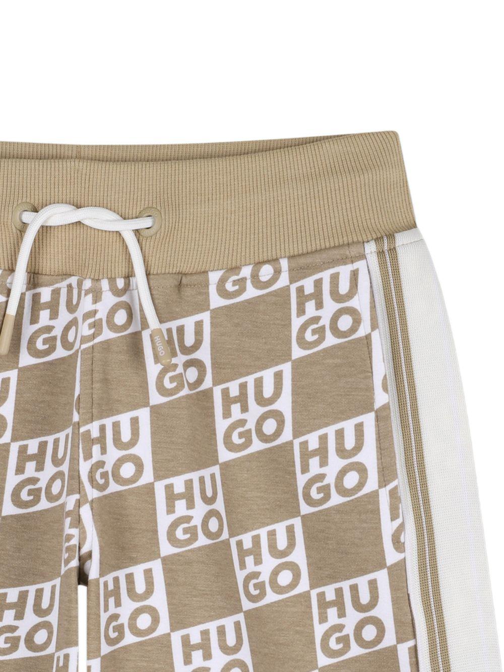 Shorts per bambino Hugo Kids beige con stampa logo all-over G00999 23B Hugo KIDS