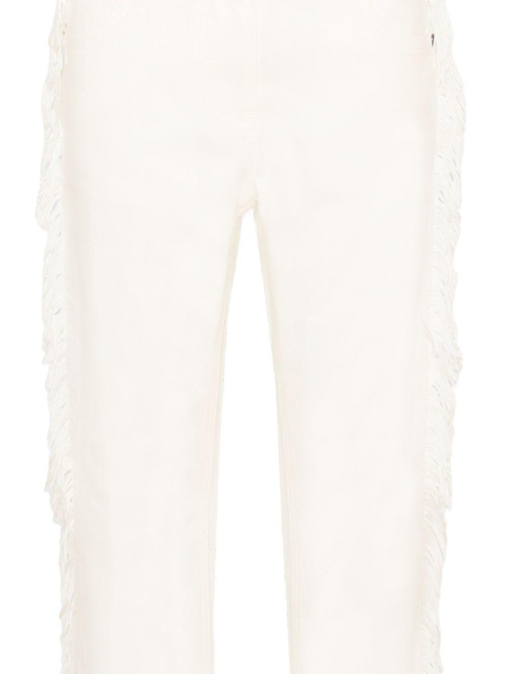 Pantaloni per bambina Stella McCartney Kids bianchi con dettaglio frange sui lati TZ6A50 Z0156 101 STELLA McCARTNEY KIDS