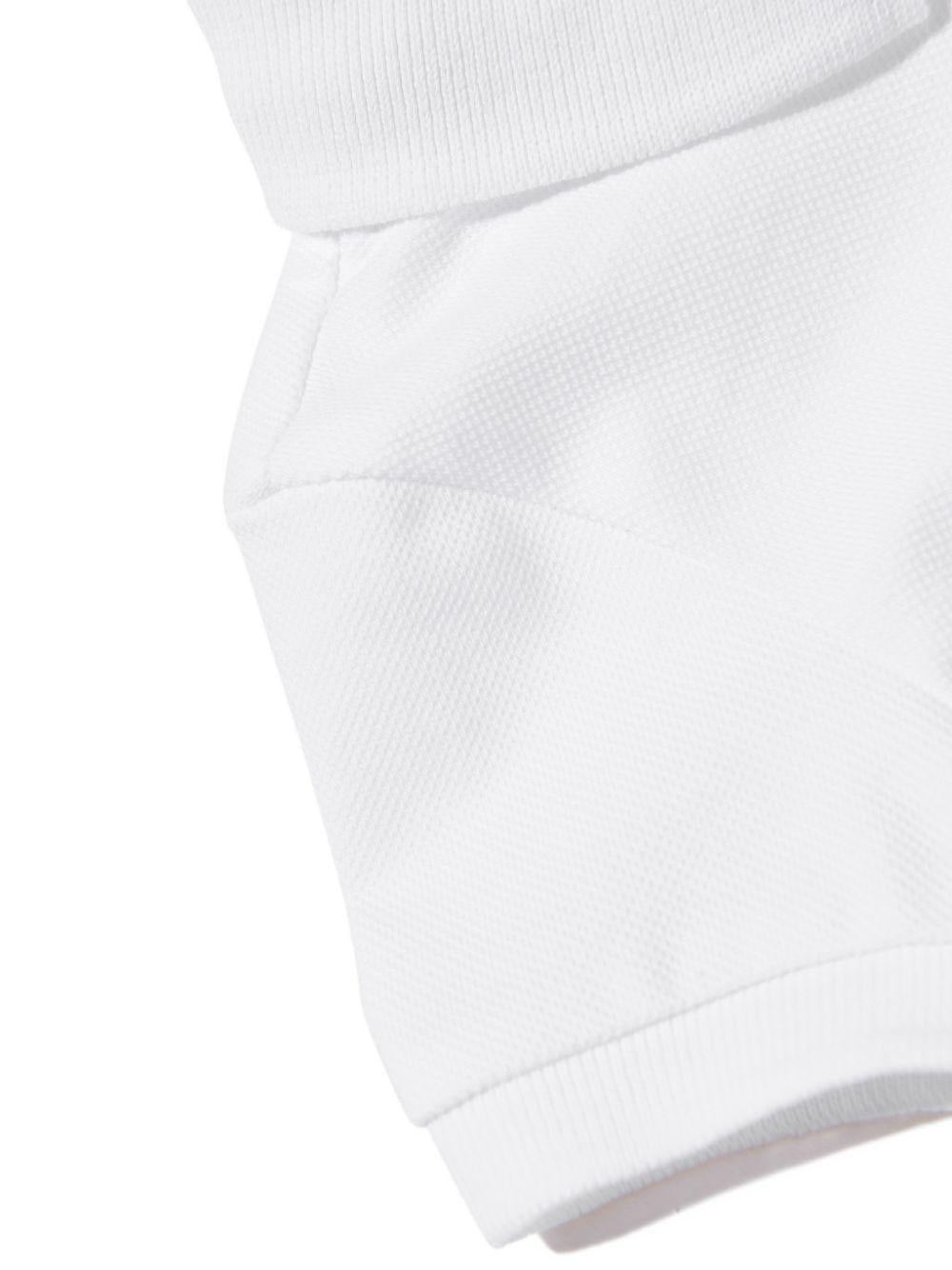 T-shirt per neonato Moschino Kids bianca con colletto stile polo MUM04JLFA09 10101 MOSCHINO KIDS