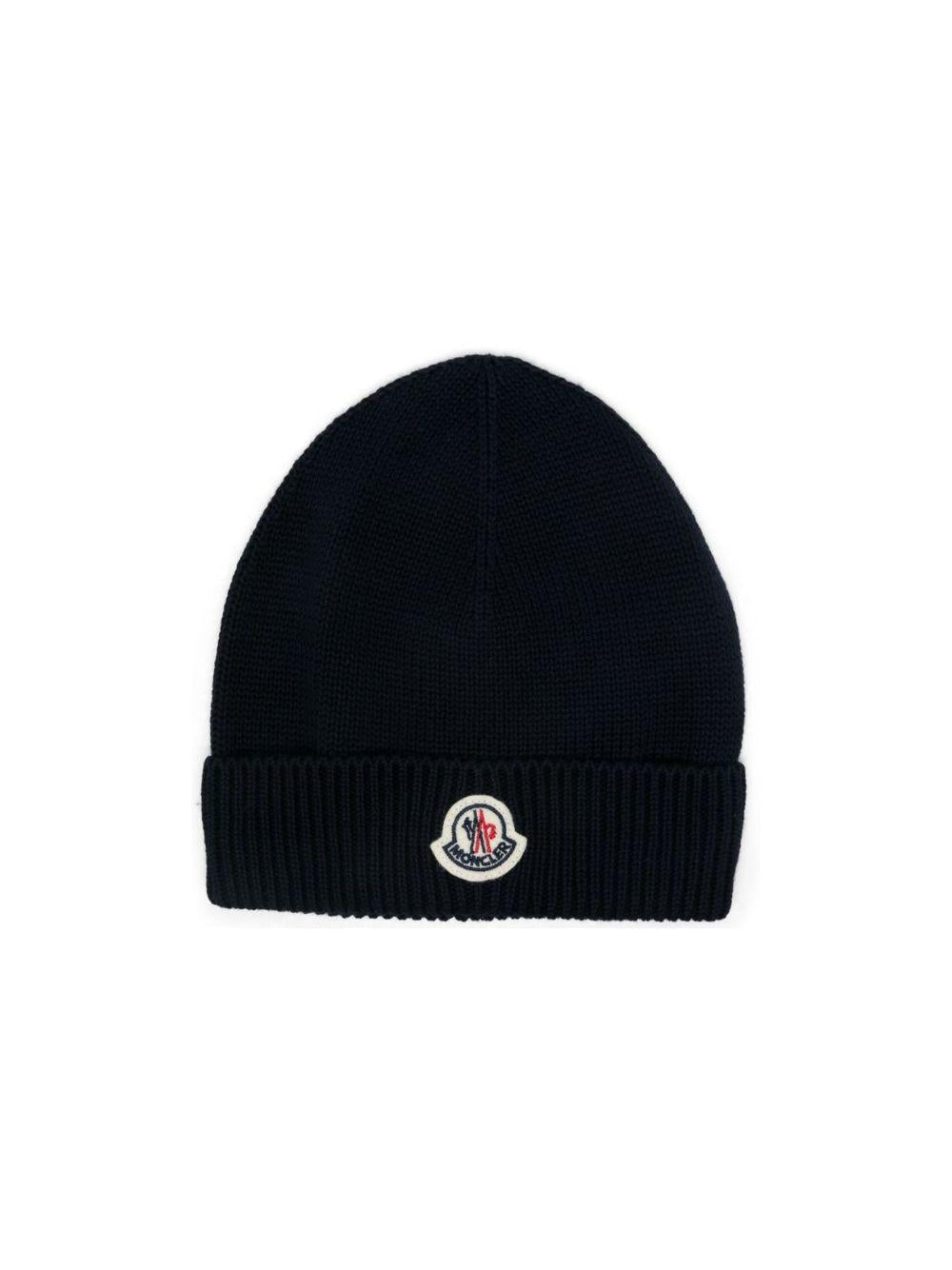 Berretto per neonato Moncler Enfant blu con ricamo toppa con logo sul davanti L19513B00006M2861 742 MONCLER ENFANT