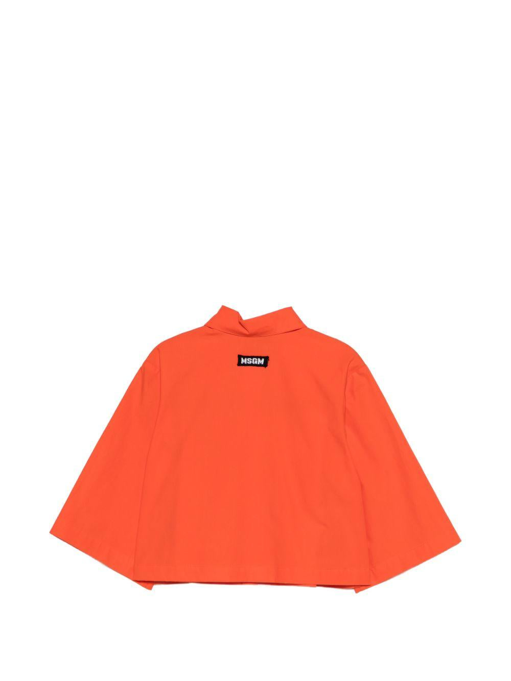 Camicia per bambina MSGM Kids arancione con dettagli a pois fucsia S6MSJGSI097 MS074 MSGM KIDS