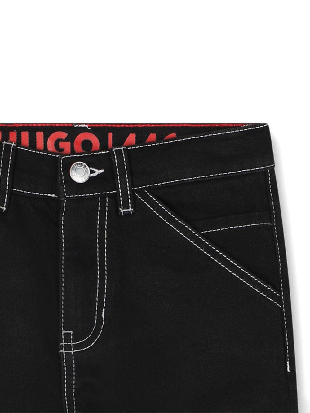 Jeans per bambino Hugo Kids neri con applicazione posteriore con logo G00473 Z09 Hugo
