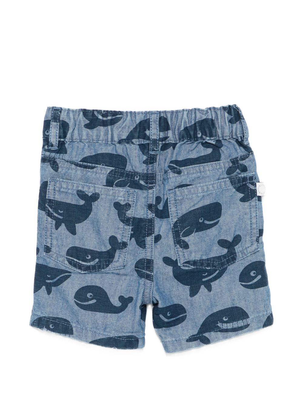 Shorts per neonato Stella McCartney Kids in denim con stampa balene TY6579 Z3621 606BL STELLA McCARTNEY KIDS