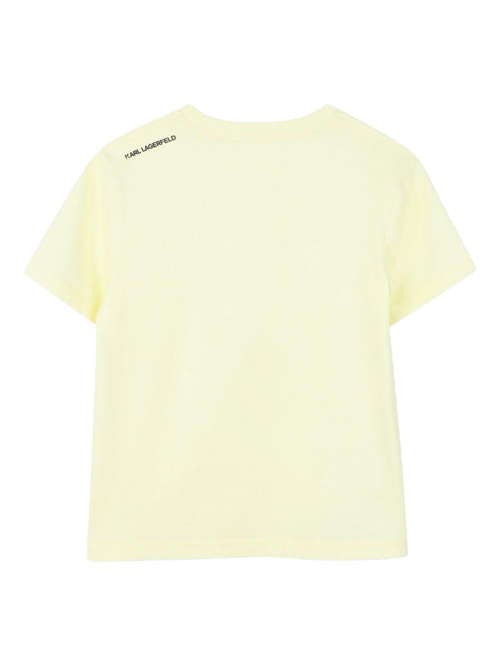 T-shirt per bambino Karl Lagerfeld Kids gialla con stampa grafica Karl sul davanti Z31094 556 KARL LAGERFELD KIDS