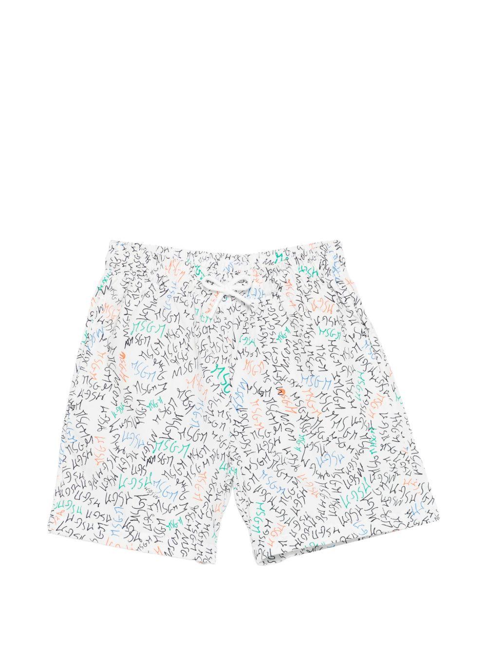 Shorts per bambino MSGM Kids bianchi con stampa logo all-over S6MSJBBE234 001 MSGM KIDS