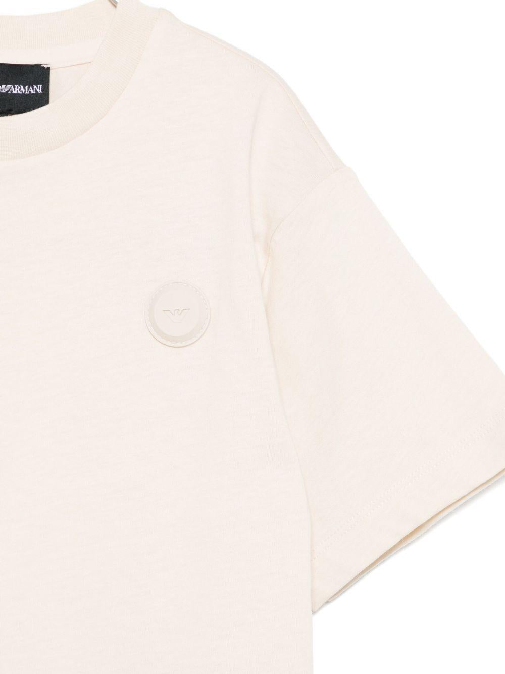 T-shirt per bambino Emporio Armani Kids beige con dettaglio logo EB000796 AF17536 U1156 EMPORIO ARMANI KIDS