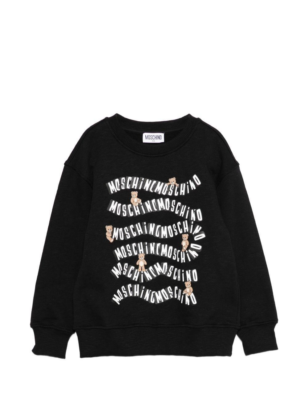 Felpa per bambino Moschino Kids nera con stampa logo all-over HUF09LLCA88 60100 MOSCHINO KIDS