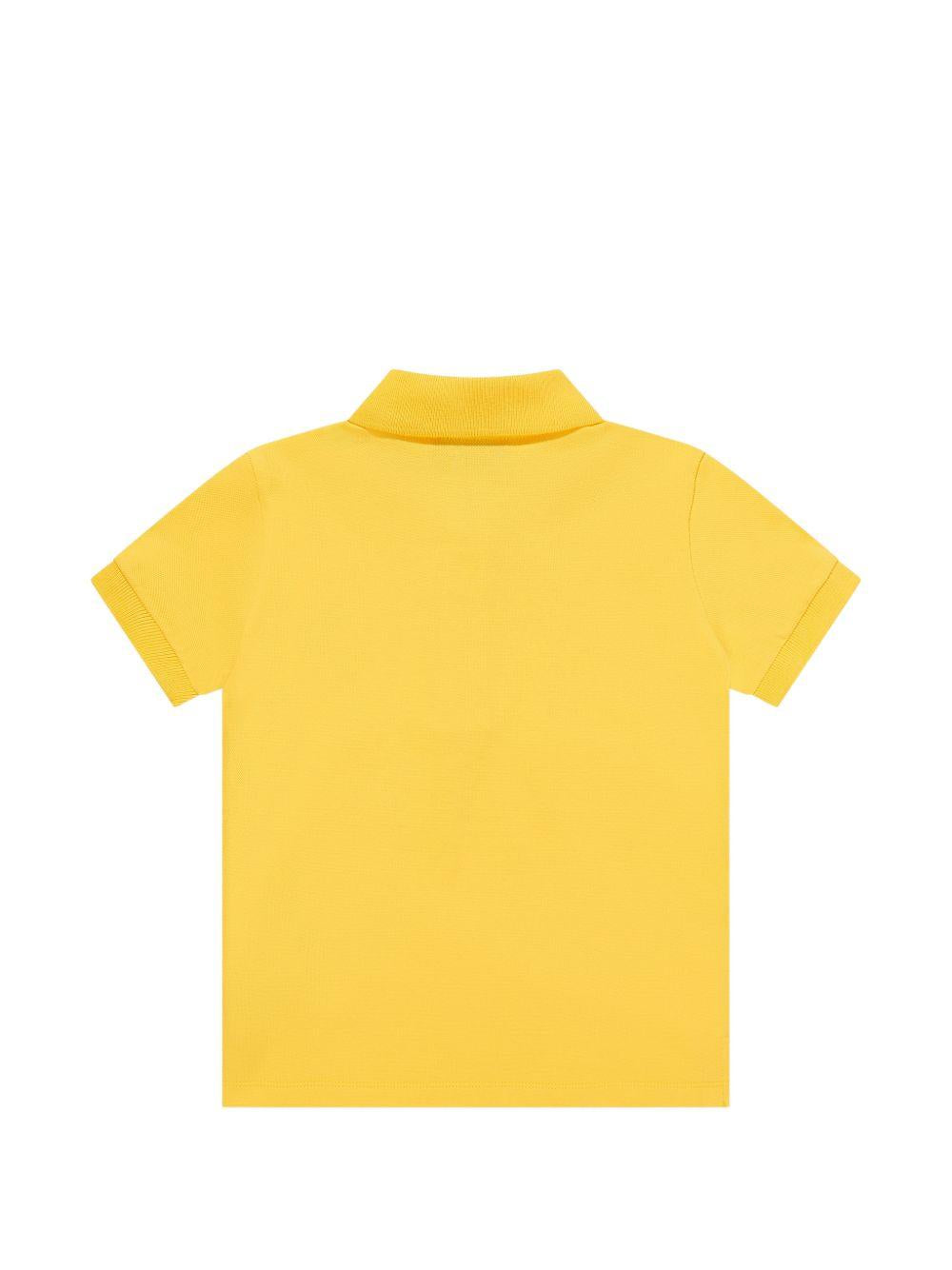 Polo da bambino Moschino kids giallo con stampa orsetto HSM03YLFA09 50577 MOSCHINO KIDS