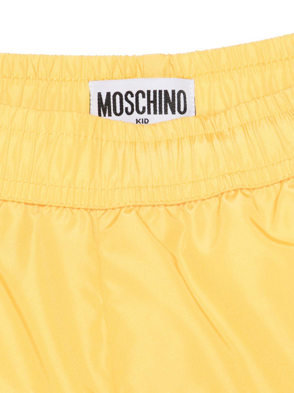 Costume da bagno per bambino Moschino Kids giallo con stampa logo HUL01LLKA02 50577 MOSCHINO KIDS