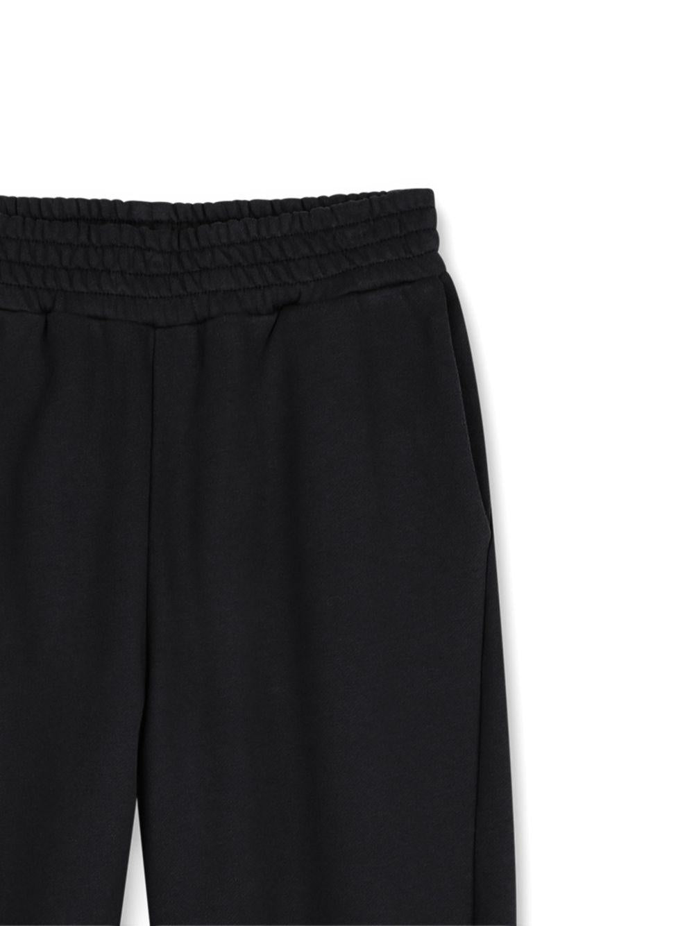 Pantaloni sportivi per bambino Givenchy Kids neri con stampa logo sul retro H31284 09B GIVENCHY KIDS