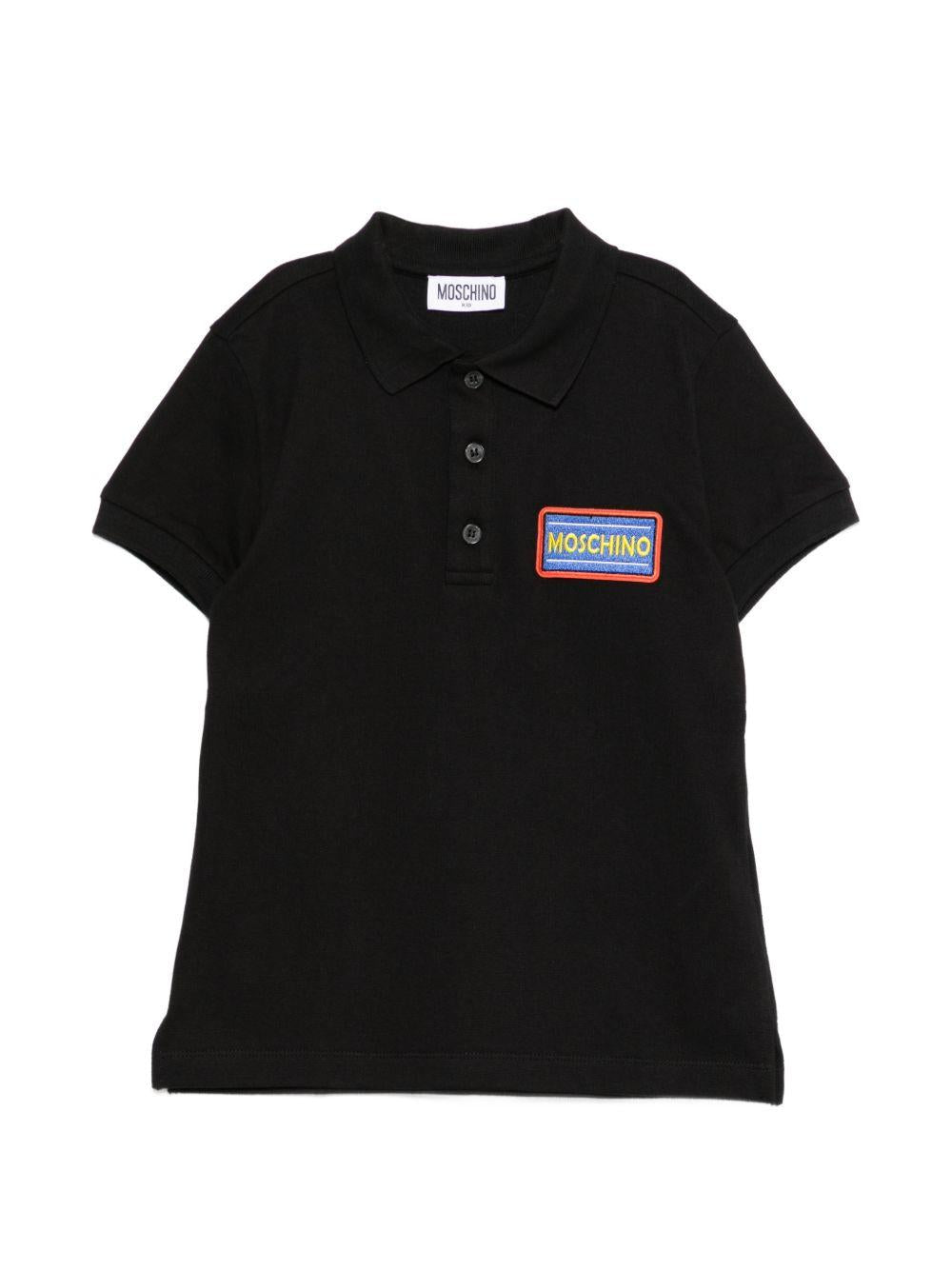 Polo per bambino Moschino Kids nero con targhetta logo HTM03YLFA09 60100 MOSCHINO KIDS