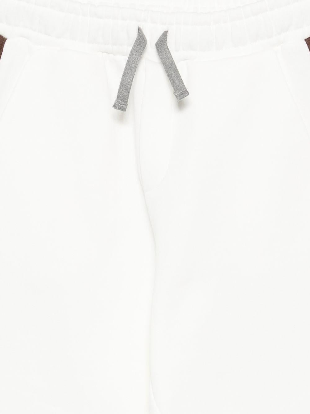 Pantaloni per bambino Eleventy Kids bianco con dettaglio righe sui lati EZ6I60 Z3999 101MA ELEVENTY KIDS