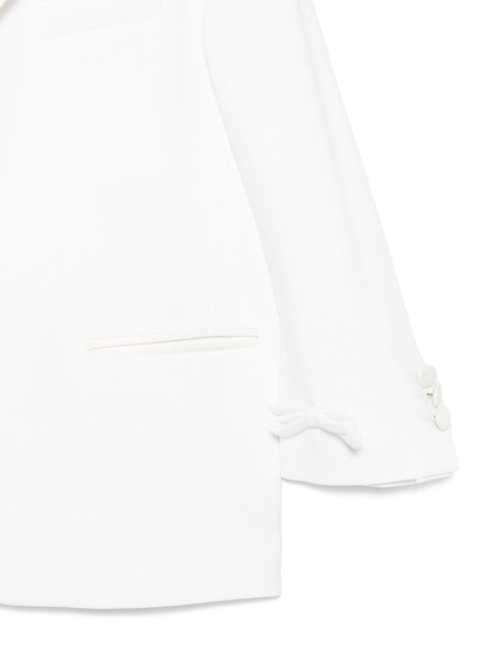 Giacca per bambina Douuod Kids bianca con dettaglio fiocco DY2A34 J0371 100 DOUUOD