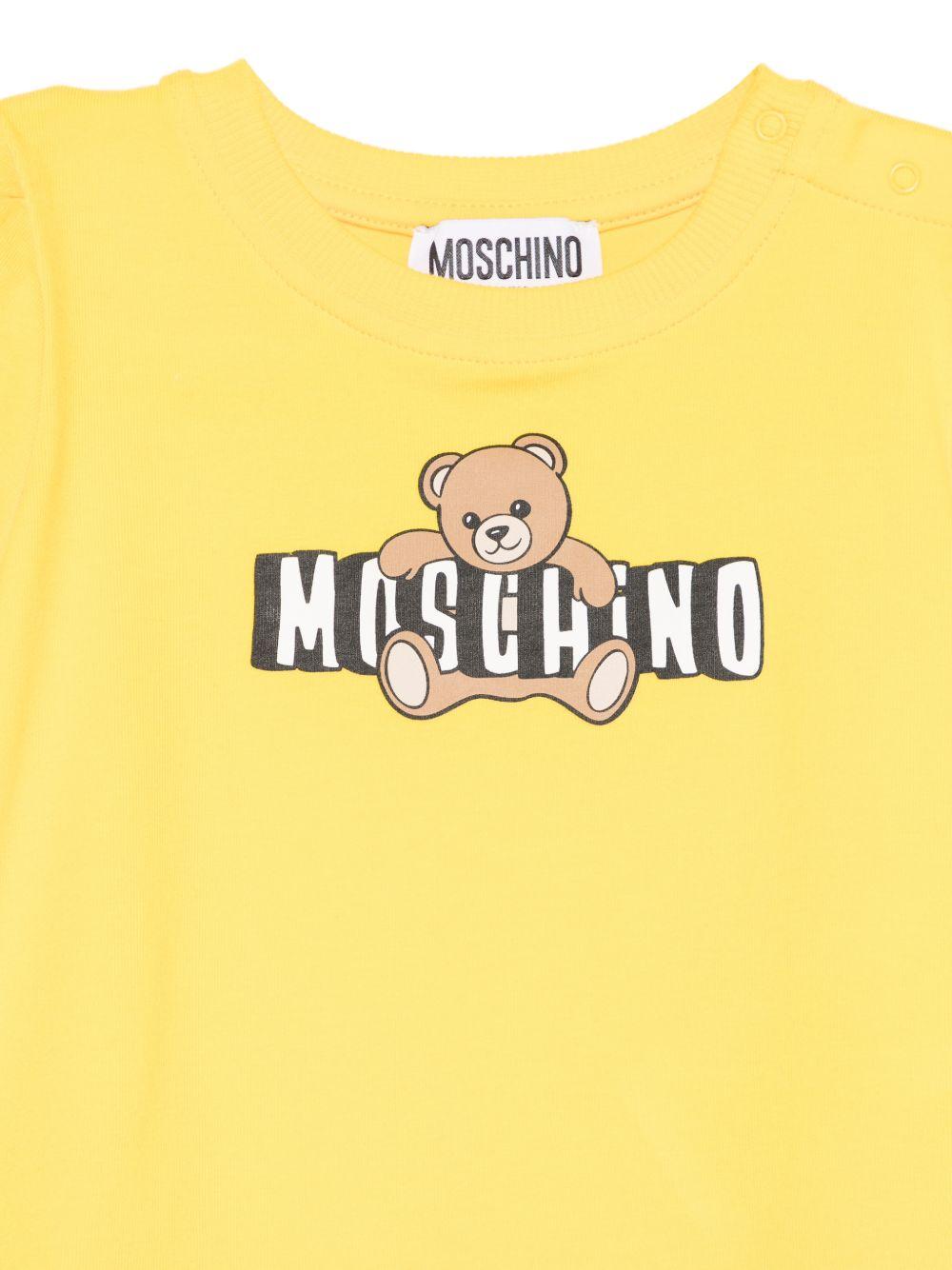 Abito per neonata Moschino Kids giallo con dettaglio logo sul davanti MAV0C7LBA00 50577 MOSCHINO KIDS