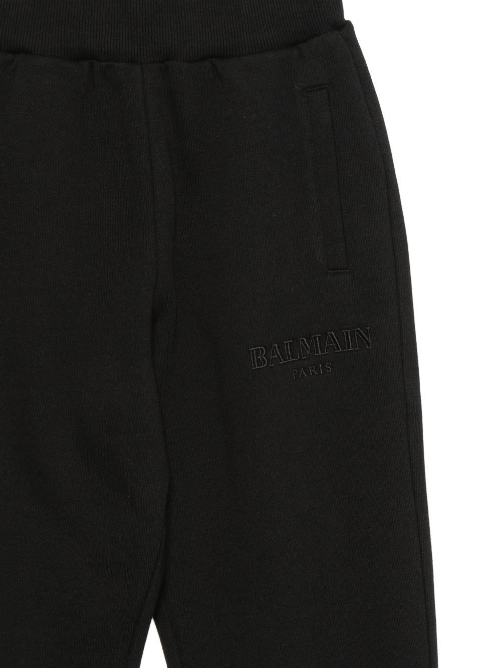 Pantaloni per bambino Balmain Kids neri con logo ricamato sul davanti BZ6I00 Z3183 930 BALMAIN KIDS