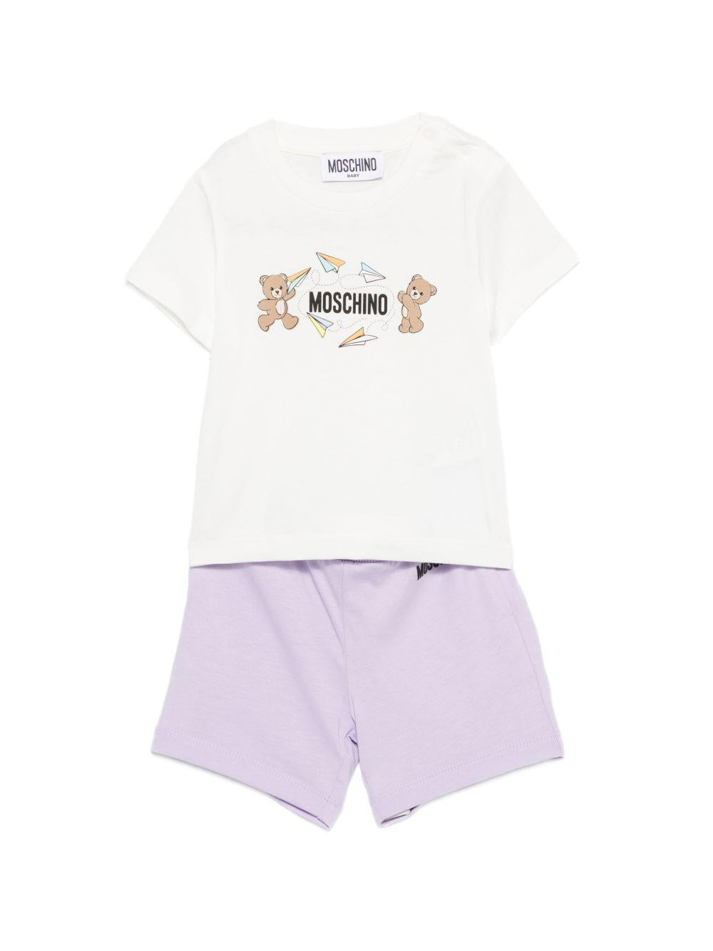 Set t-shirt e shorts per neonata Moschino Kids bianco e lilla con stampa M5G00MLAA01 83695 MOSCHINO KIDS