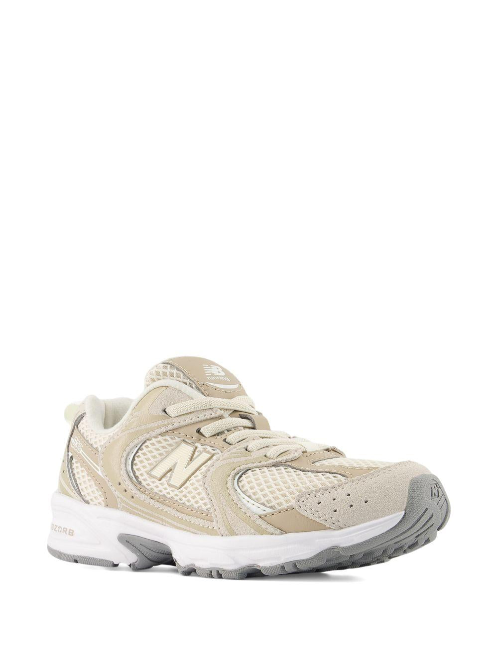 Sneakers 530 per bambini New Balance Kids beige con logo sulla linguetta P530 5C7 NEW BALANCE KIDS