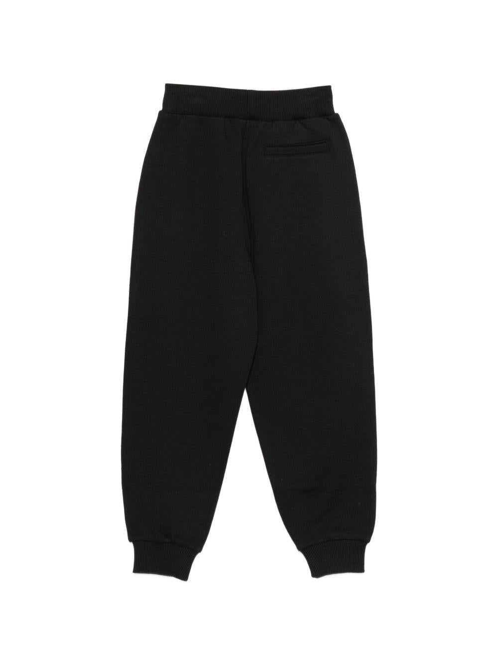 Pantaloni per bambino Balmain Kids neri con logo ricamato sul davanti BZ6I00 Z3183 930 BALMAIN KIDS