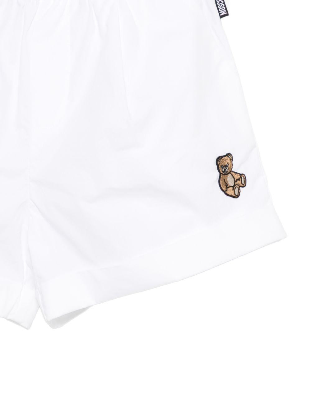 Shorts per bambina Moschino Kids bianco con stampa sul davanti HDQ01YLLA10 10101 MOSCHINO KIDS