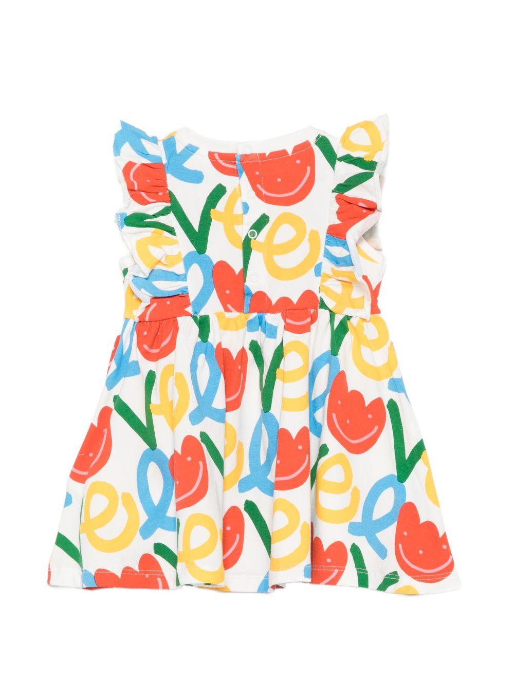 Abito per neonata Stella McCartney Kids bianco con stampa grafica all-over TY1141 Z3561 101MC STELLA McCARTNEY KIDS