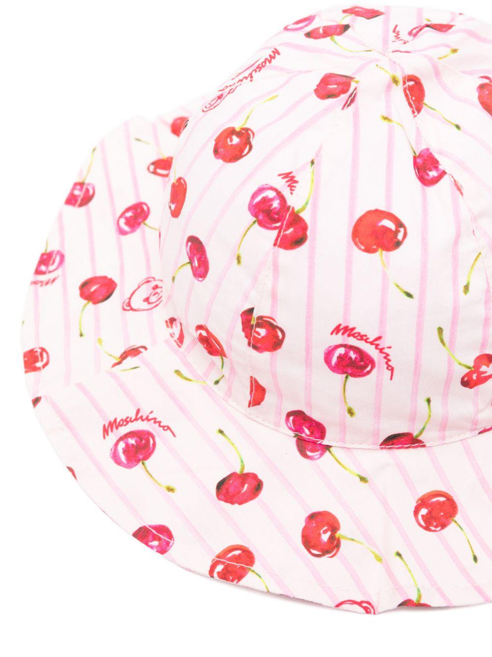 Cappello per neonata Moschino Kids bianco con stampa ciliegie all-over MDX028LLB66 83658 MOSCHINO KIDS