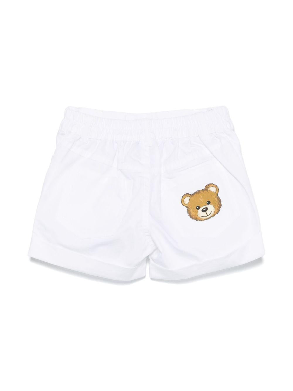 Pantaloncini con stampa logo per neonato Moschino Kids bianco con elastico in vita MUQ01JLLA03 10101 MOSCHINO KIDS