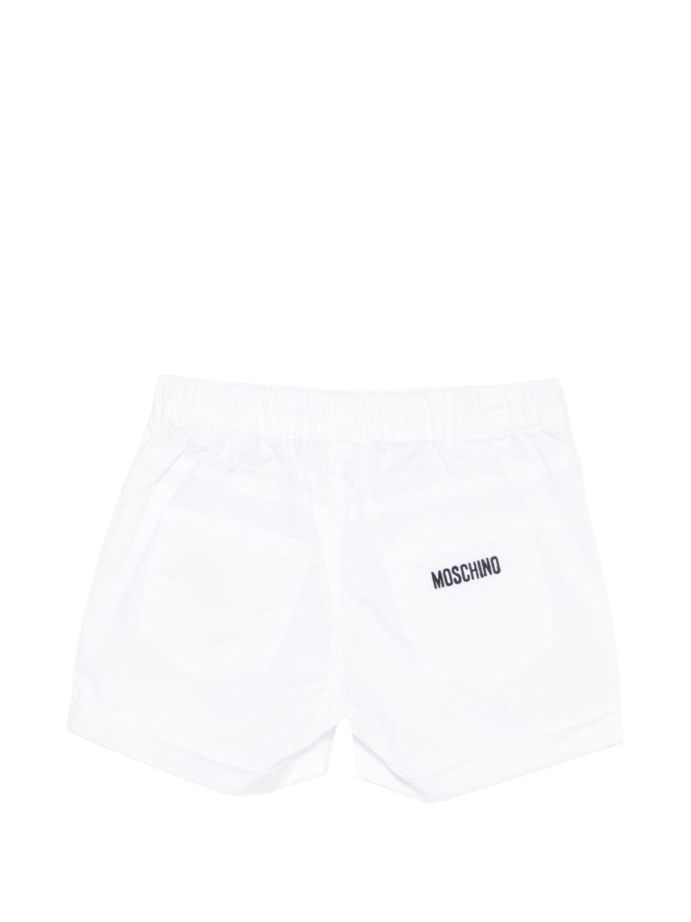 Shorts per neonato Moschino Kids bianchi con logo sul retro MNQ00RLLA10 10101 MOSCHINO KIDS