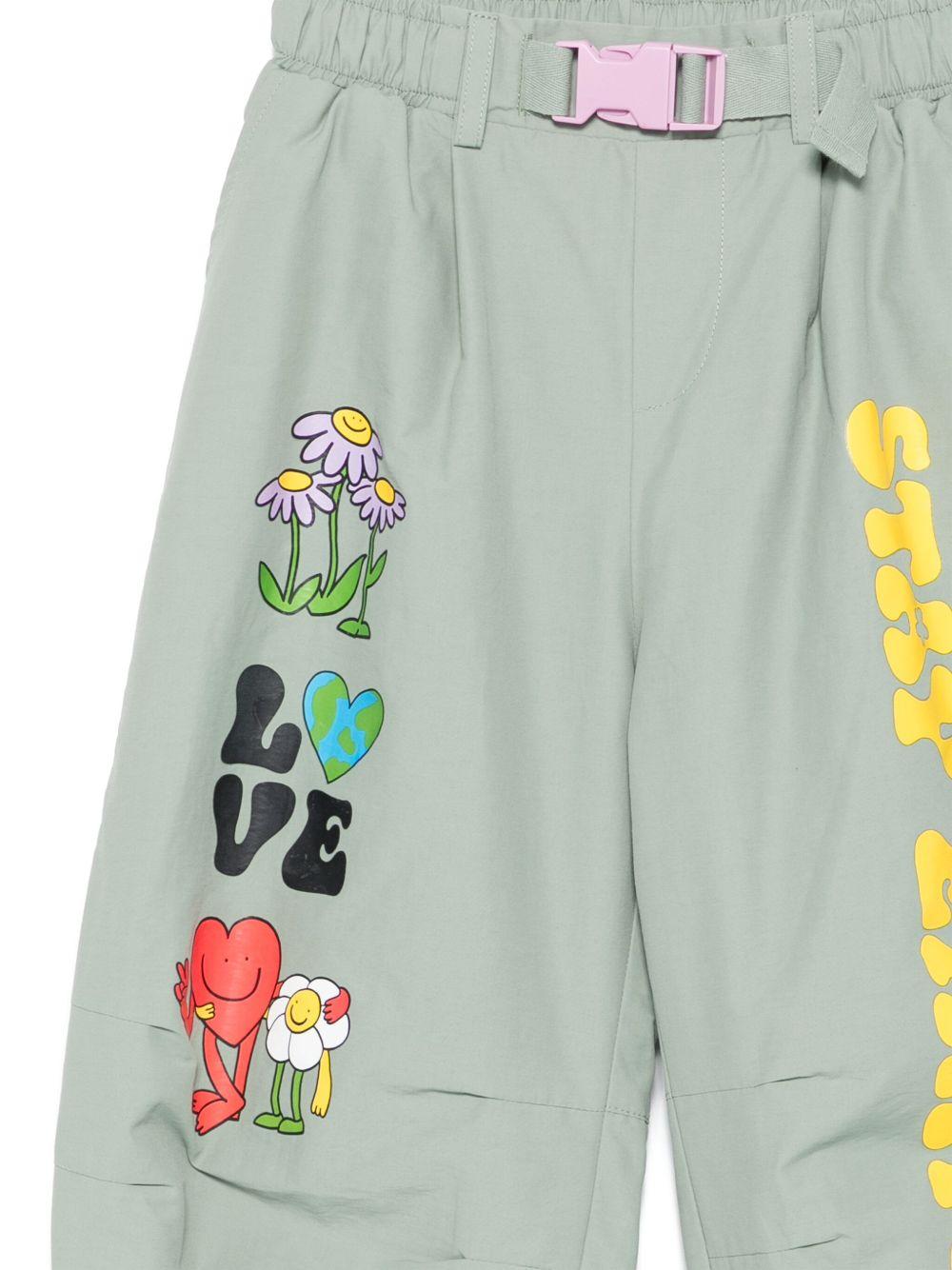 Pantaloni per bambina Stella McCartney Kids verde con stampa grafica TX6A60 Z2333 718 STELLA McCARTNEY KIDS