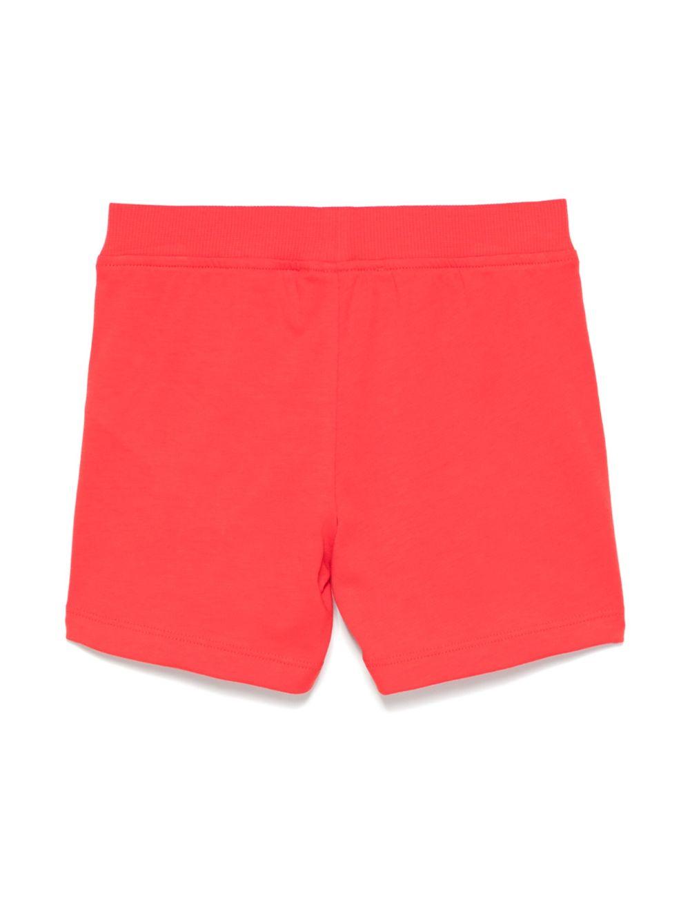 Shorts per neonato Moschino Kids rosso con stampa logo con vita elasticizzata MUQ01LLAA23 50109 MOSCHINO KIDS