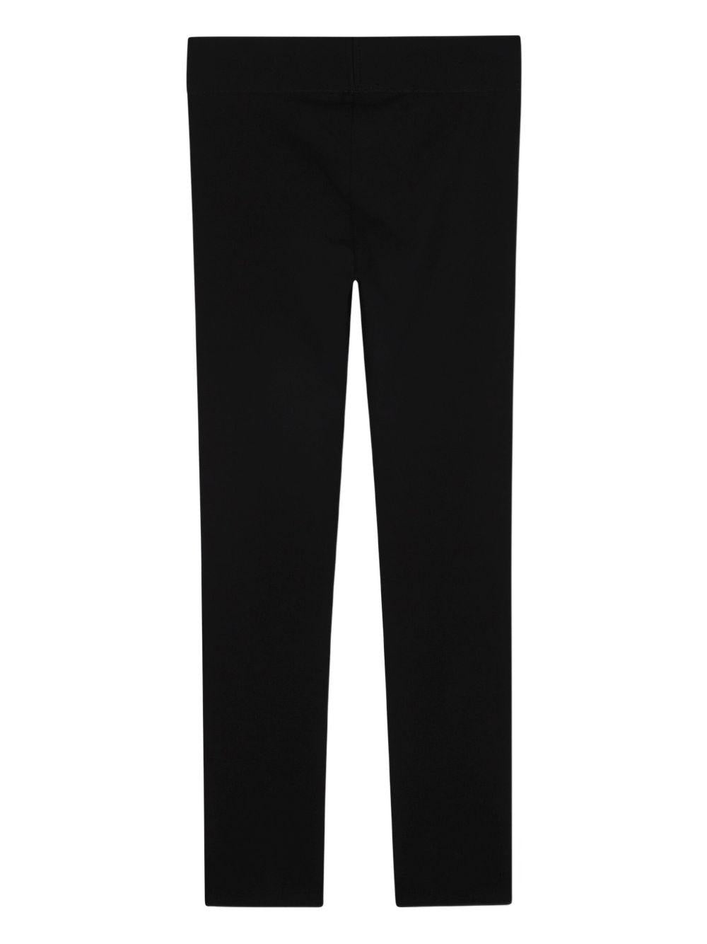 Leggings per bambina Dkny Kids neri con stampa logo D62365 09B DKNY
