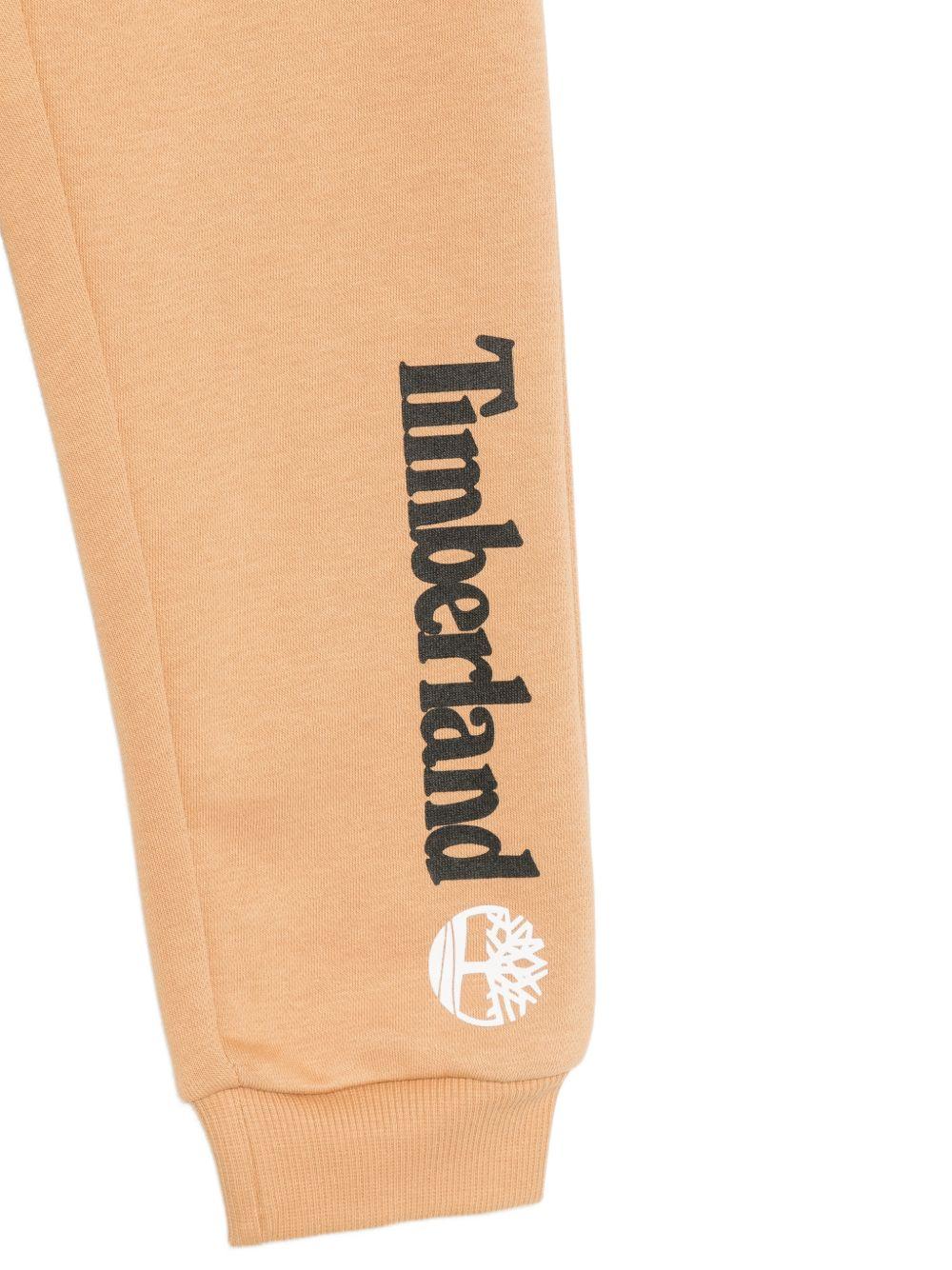 Pantaloni sportivi per bambino Timberland Kids beige con logo sulla gamba T60974 230 TIMBERLAND KIDS
