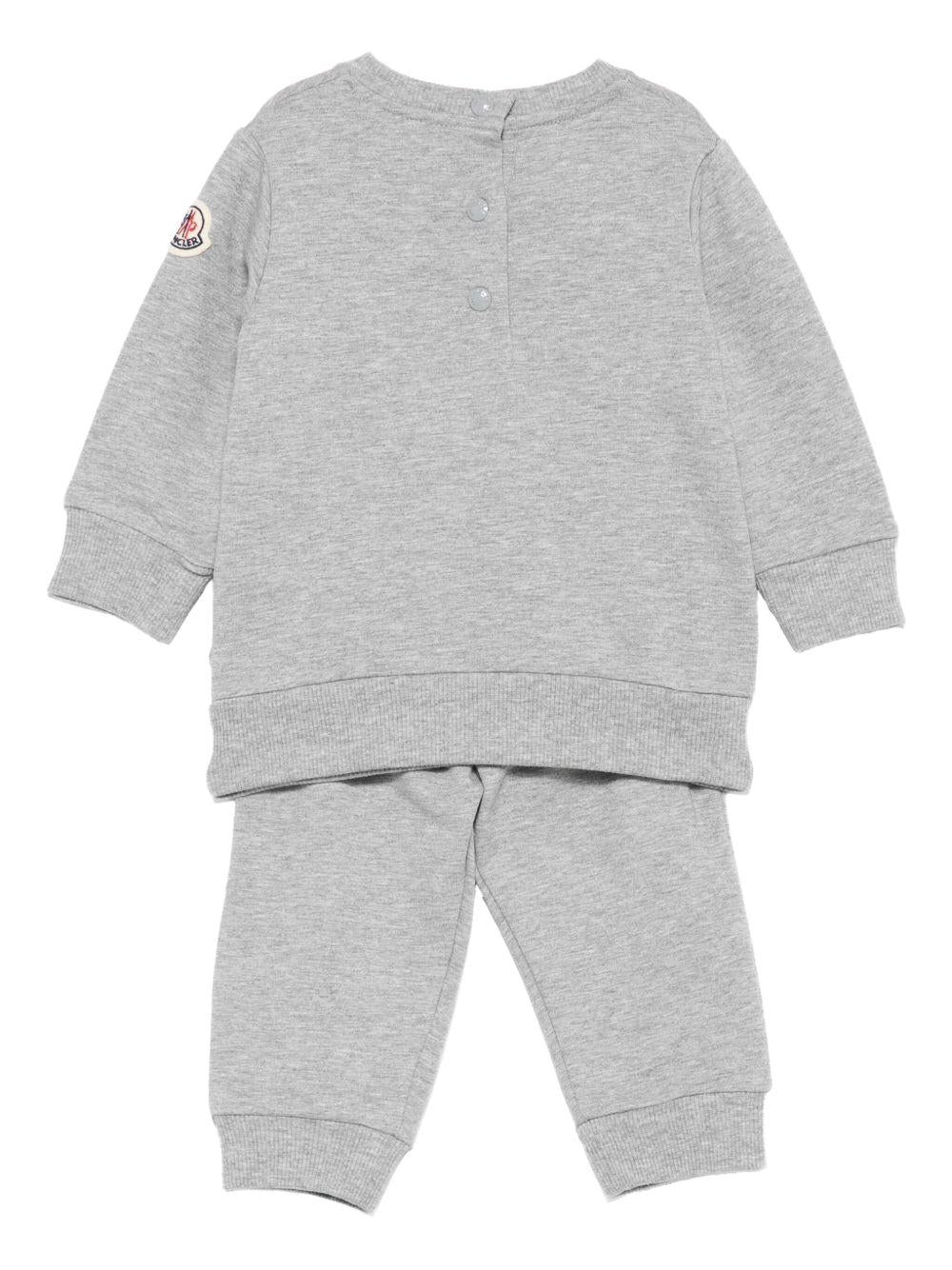 Tuta sportiva per neonato Moncler Enfant grigio con ricamo K29518M0000889AM3 980 MONCLER ENFANT