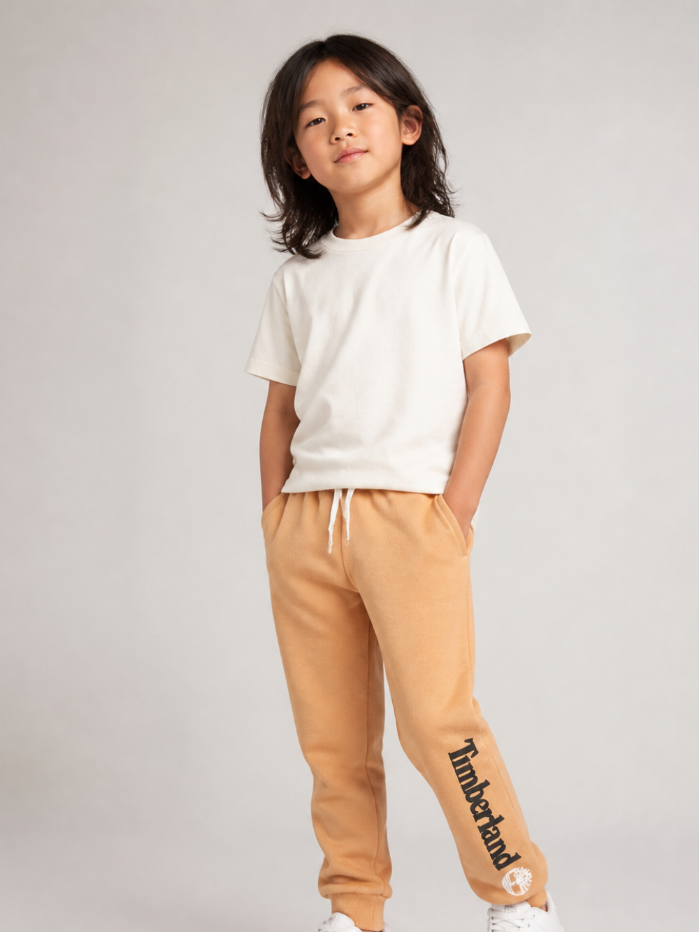 Pantaloni sportivi per bambino Timberland Kids beige con logo sulla gamba T60974 230 TIMBERLAND KIDS