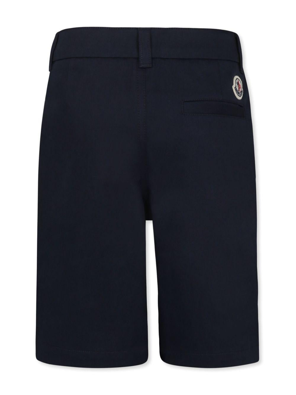 Bermuda con logo per bambino Moncler Enfant blu con passanti K19542B00002597G4 744 MONCLER KIDS