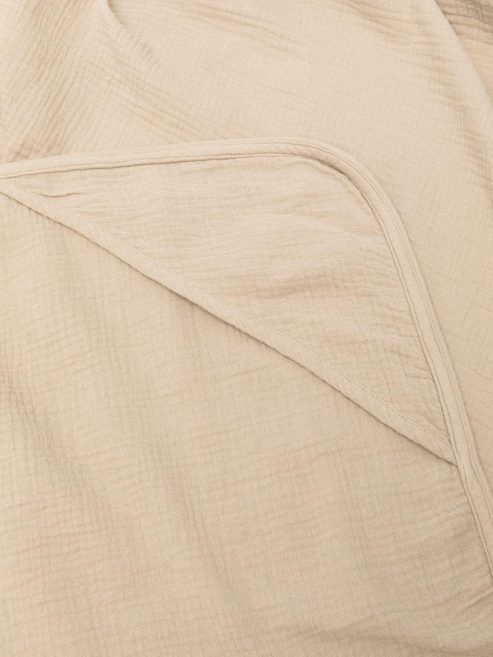 Coperta Plokie per neonati Donsje beige con ricamo orsetto 7100101 00017 DONSJE